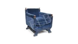 Unknown Creator - Blue velvet armchair with carved armrest details 